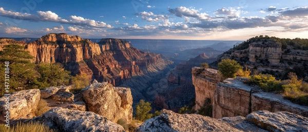 Obraz Scenic canyon vista at sunset with towering rock formations and a hazy horizon