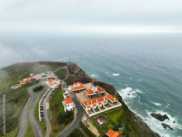 Fototapeta Close drone view of Cabo da Roca lighthouse and cliffside facility