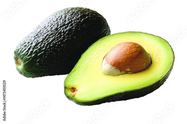 Fototapeta Close up view of one whole and one halved avocado on a dark surface area on transparent background png