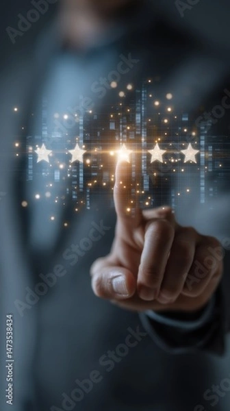 Fototapeta A businessperson"s finger touches a glowing virtual interface with five stars, symbolizing a high rating or feedback in a digital environment.