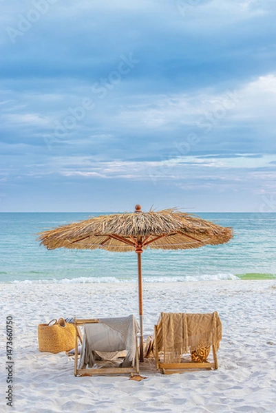 Fototapeta beautiful tranquil white sand beach with two beach chair and thatched umbrella with copy space. romantic summer vacation at tropical private island for luxury sea resort advertising background.