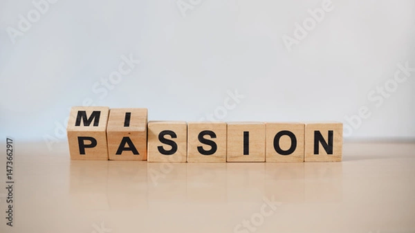 Obraz Fliped wooden cubes and changed the inscription 'mission' to 'passion' or vice versa. Beautiful wooden table, white background, copy space