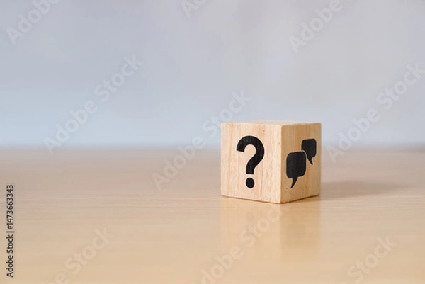Fototapeta Q and A concept. Q and A symbols on wooden cube block on a grey background. Illustration for frequently asked questions concepts in websites, social networks, business issues. Recommendation concept.