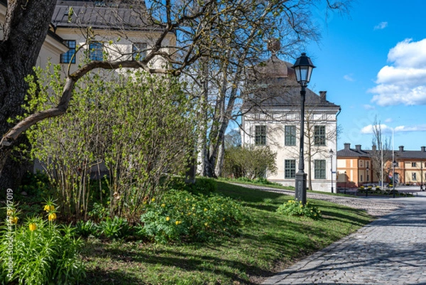 Fototapeta The Odinslund Park on a sunny spring day in late April. The park connects Carolina Rediviva and Cathedral Hill in Uppsala, Sweden