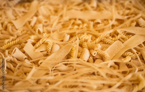 Fototapeta composition of raw Italian Spaghetti and pasta Different shapes.