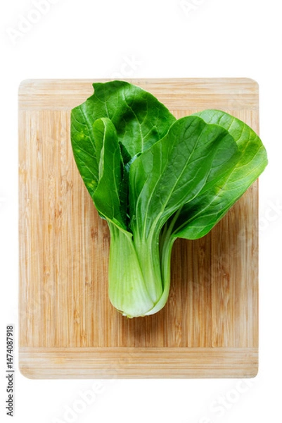 Obraz Fresh Chinese cabbage pak choi on a wooden board. Vertical top view