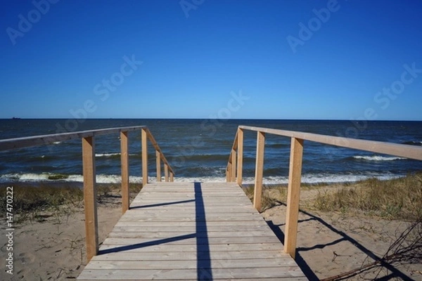 Fototapeta beach sea water pier sky ocean blue sand walkway sun