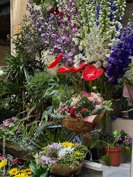 Fototapeta A Vibrant Display of Freshly Arranged Flower Bouquets A vibrant display of flowers in a flower shop