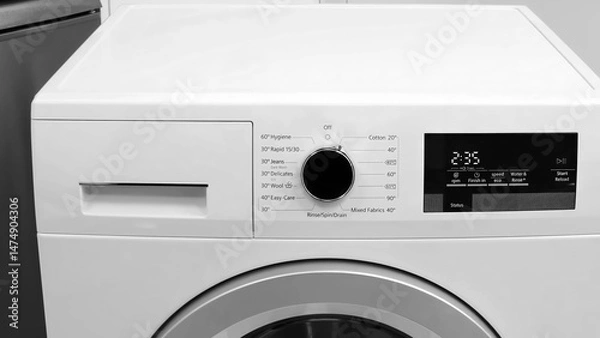 Fototapeta washing machine detergent drawer control panel, screen for cycle time, settings, controls detergent, softener, and additives, includes detergent drawer flap.