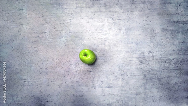Fototapeta A perfect green apple centered on gray background, empty space surrounding it, emphasizing the simplicity and freshness of the fruit.