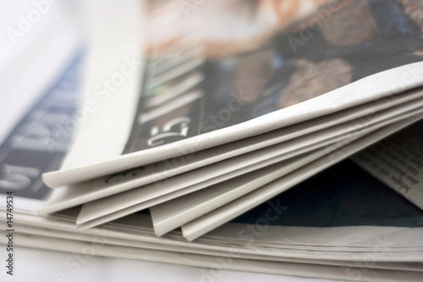 Obraz rolled up newspaper cloeseup