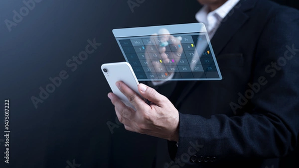 Fototapeta Reminder for Calendar and Organizer's Agenda Appointments  Event planners utilize agendas and schedules to plan and coordinate events.  The woman was taking notes on the calendar app on her phone.