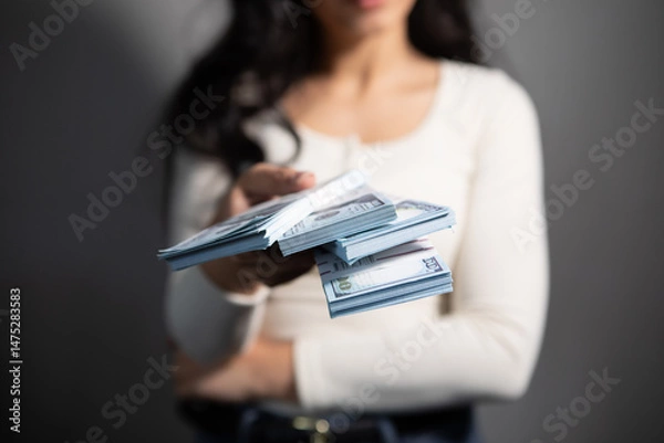 Obraz woman with pile of money