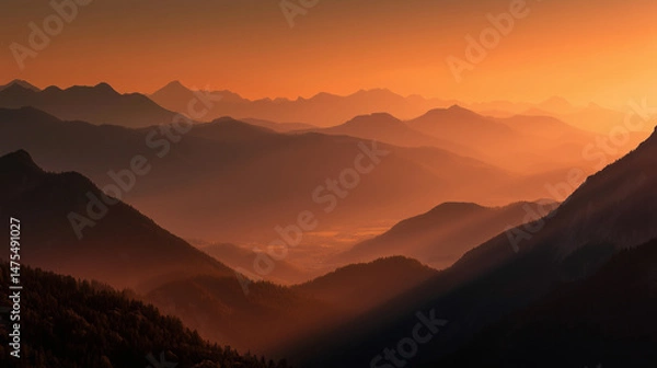 Obraz Warm orange light enveloping the Austrian Alps at sunset, creating a breathtaking scene of majestic peaks and tranquil valleys