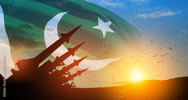 Fototapeta The missiles are aimed at the sky with birds at sunset with Pakistan flag. Nuclear bomb, chemical weapons, missile defense, a system of salvo fire.