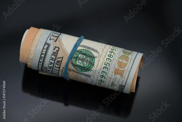 Fototapeta Rolled up dollar bill
