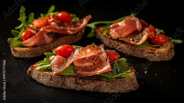 Fototapeta Bruschetta with Jamon, Cherry Tomatoes, and Lettuce