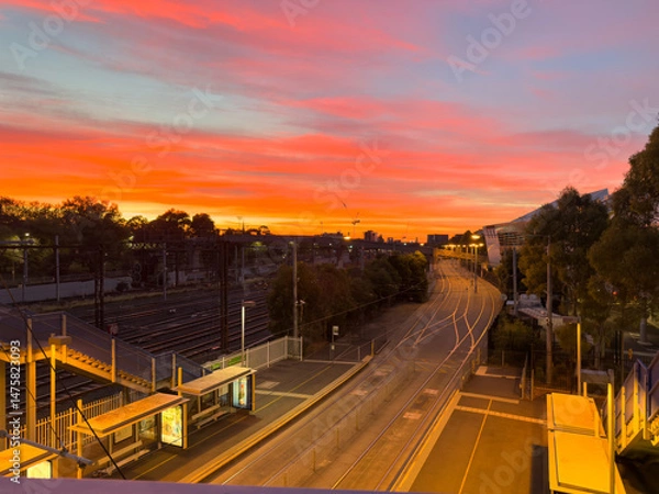 Fototapeta An early morning view along the number 70 tram line towards Richmond, near John Cain Arena and the MCG