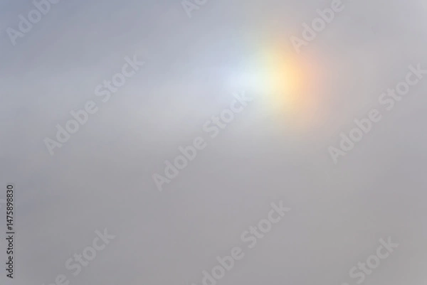 Obraz Rainbow flare light phenomenon in the daytime sky