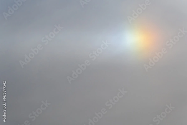 Obraz Rainbow flare light phenomenon in the daytime sky