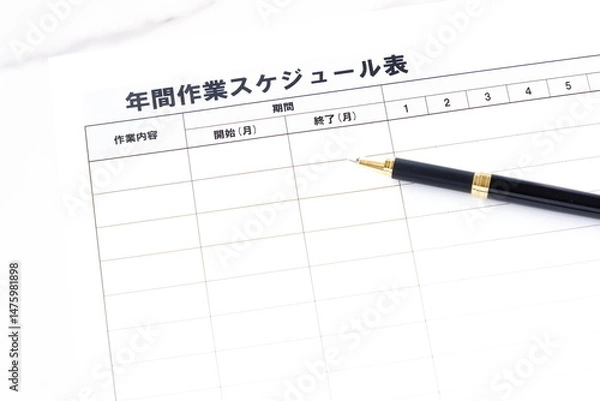 Fototapeta 年間作業スケジュール表で業務のスケジュールと進捗状況を管理する
