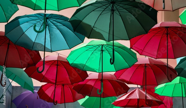 Obraz colorful umbrellas fly towards the Spring sky