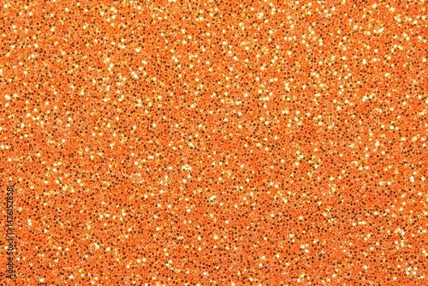 Fototapeta Orange Glitter Texture Christmas Background Sparkling with Festive Warmth and Seasonal Cheer