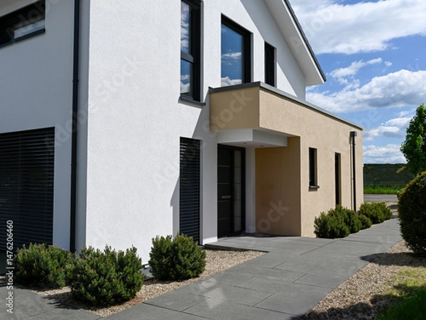 Fototapeta Hauseingang eines modernen Eigenheims