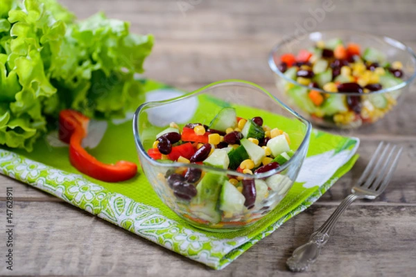 Fototapeta Fresh spring salad with sweet pepper, cucumbers and haricot