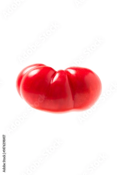 Fototapeta Heirloom tomato on white background, minimal composition