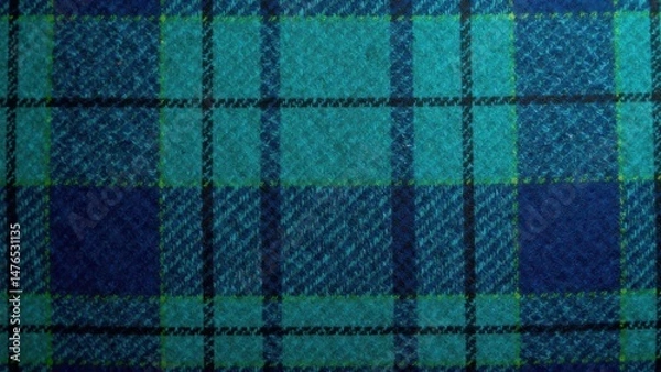 Obraz High-resolution close-up detailed image showing the texture of a teal and navy blue plaid fabric with subtle variations in the weave