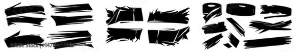 Fototapeta The collection includes black paper strips that are ripped, with rectangular cutouts having torn edges and shredded page remnants, set against a grunge backdrop with silhouettes and rough, jagged