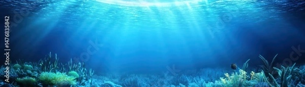 Fototapeta Underwater Scene with Soft Light Rays Illuminating Coral Reef and Marine Life in Clear Blue Ocean Water