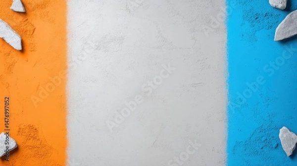 Obraz Abstract background with vertical orange, grey textured, and blue color bands and scattered rocks