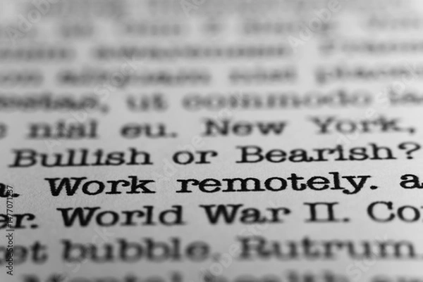 Obraz Work remotely. Text printed on a page. A piece of paper with a phrase written in retro typewriter font