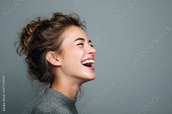 Obraz Woman Laughing in Profile on Grey Background