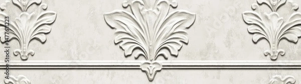 Fototapeta Intricate white floral plaster molding design showcasing elegant craftsmanship. set against a smooth gray wall. ideal for interior design inspiration and architectural details