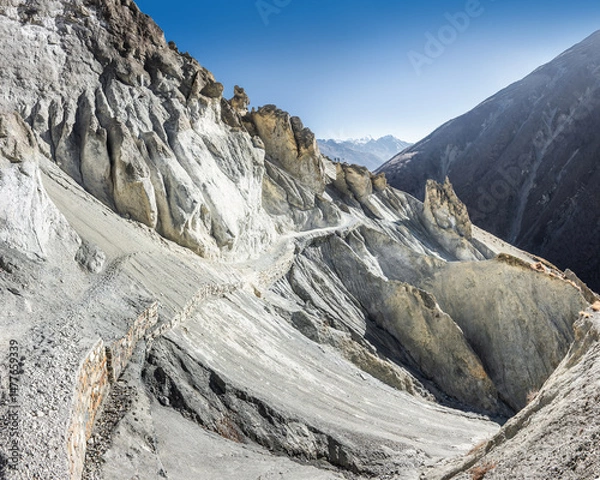 Obraz Well-paved and wide trekking route in landslide area near Tilicho base camp. Tilicho trek, a part of the Annapurna circuit in Himalaya mountains, Nepal.