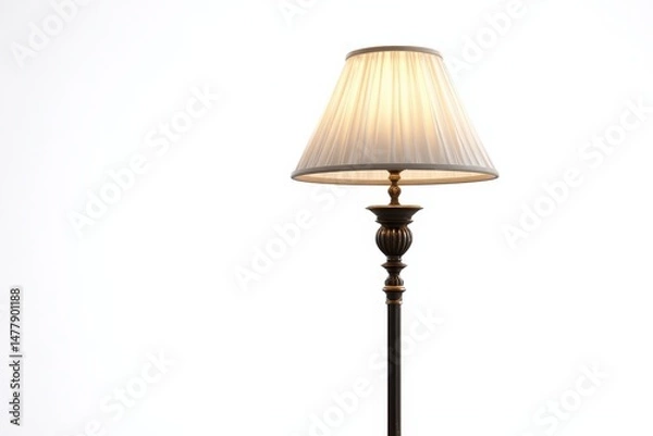 Fototapeta Elegant floor lamp with a pleated off-white shade, casting a warm glow against a bright white background. The lamp's dark bronze finish adds a touch of sophistication.
