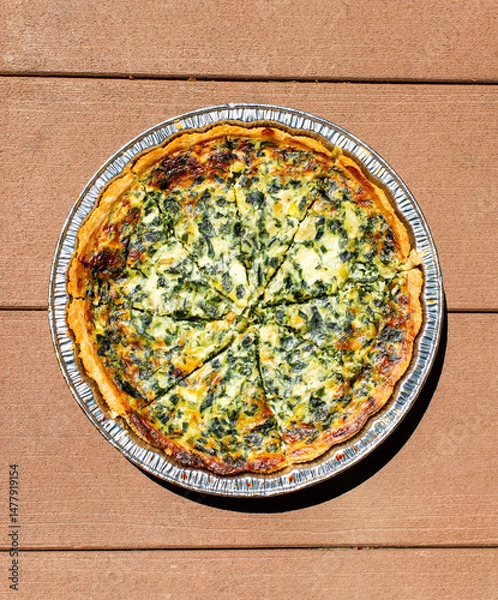 Obraz Spinach Quiche pie on a wooden background 