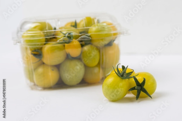 Obraz Yellow Cherry Tomatoes on White Background