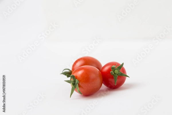 Obraz Red Cherry Tomatoes on White Background