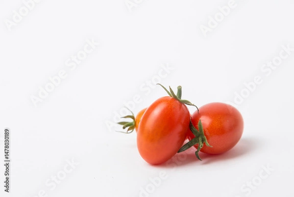 Obraz Red Cherry Tomatoes on White Background
