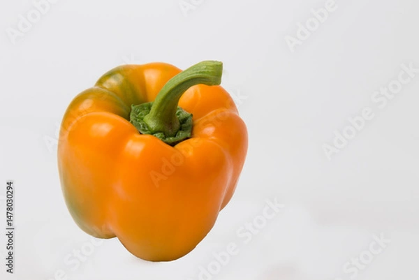Obraz Orange Bell Peppers on White Background