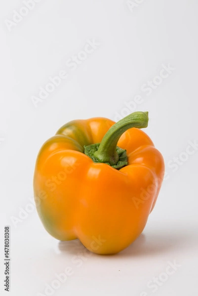 Obraz Orange Bell Peppers on White Background