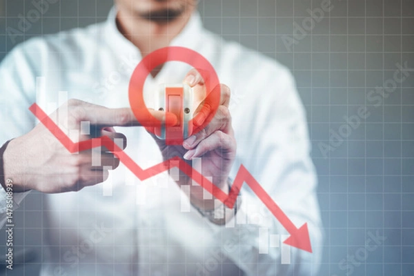 Fototapeta Economic Shutdown – Crisis, Collapse, and Market Downturn, Hand pressing the off switch button