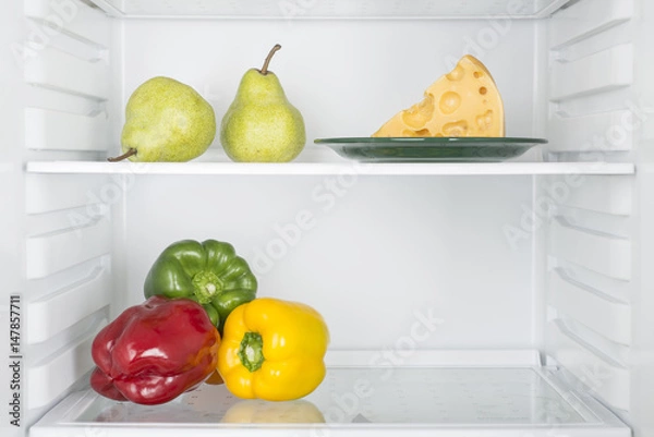 Fototapeta Open fridge full of fresh fruits and vegetables