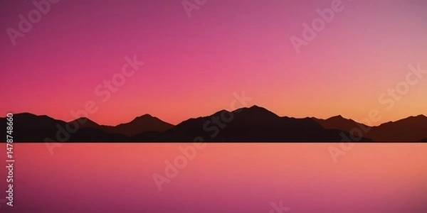 Fototapeta Serene Sunset Over Silhouetted Mountains Reflecting In Calm Pink Water Peaceful Tranquil Evening Landscape Nature Beauty