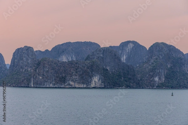 Obraz Halong Ha Long Bay Hanoi this Vietnamese wonder is littered with mountains and Rock cliffs popping out of the ocean, lush green mountains in Vietnam