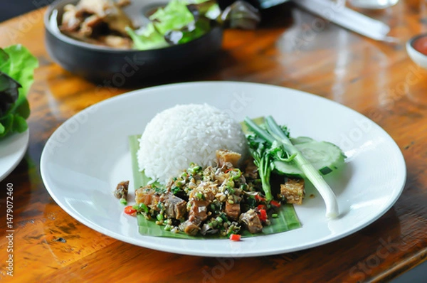 Fototapeta stir fried pork or deep fried pork , fried pork or crispy pork and rice  or pork and rice